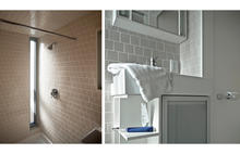 Slit window in shower allows plentiful amounts of natural light into the bathroom. - Photo Credit: Ken McCown