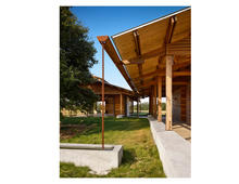 A large shared gutter celebrates the value of water. - Photo Credit: Casey Dunn